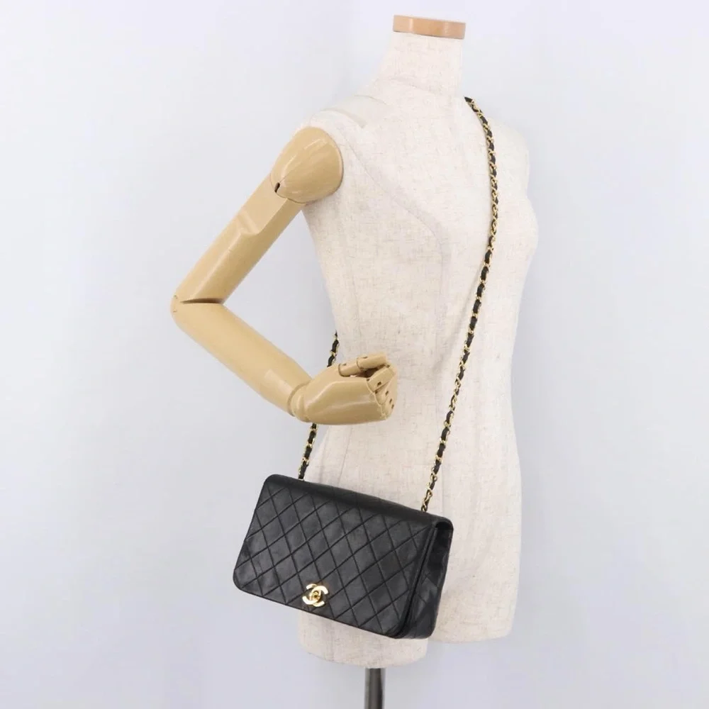 CHANEL Black Quilted Leather Shoulder Bag with Gold Hardware